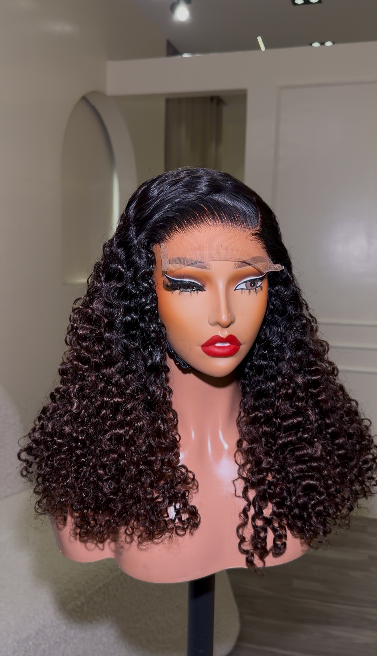 K16 Curly